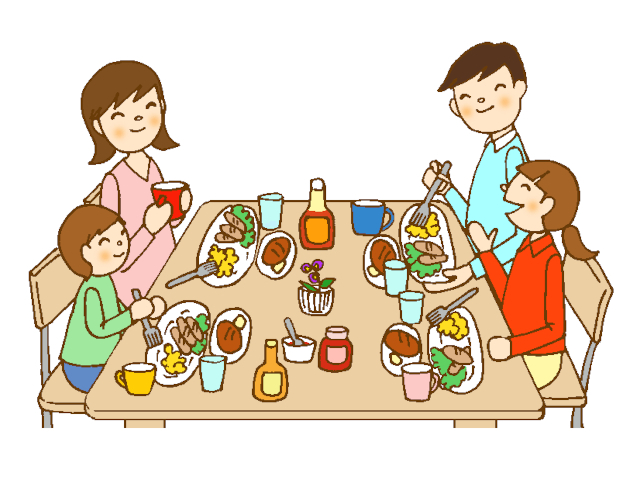 一緒に食事する家族