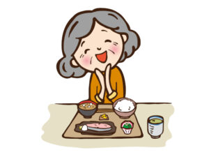 食事を楽しむシニア女性