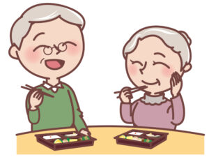お弁当を食べるシニア夫婦